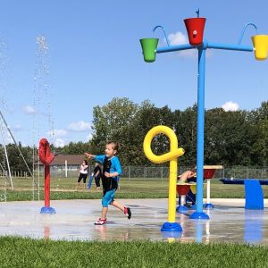 Young children playing at the spray park