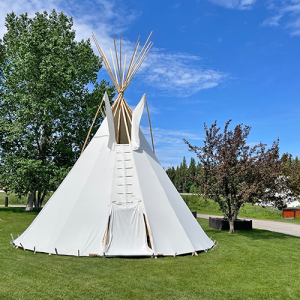 Tipi set up outside the hotel on the grass