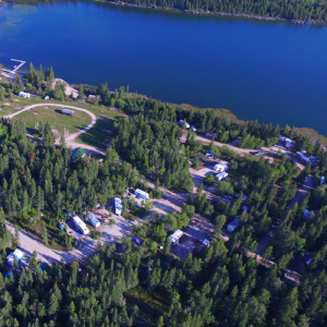 aerial view of the campground nestled along Rocky Lake in the summer