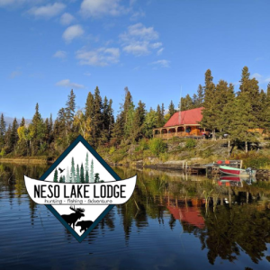 View of the lodge & dock from the lake with their company logo in the corner