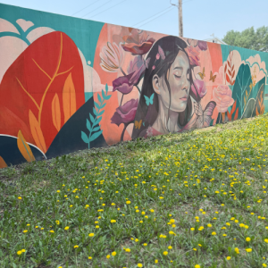 2025 mural by Artist Nereo Zorro along the UCN walking path